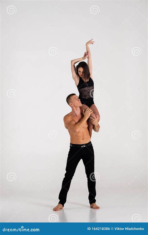 Duo Of Acrobats Showing Trick Isolated On White Stock Photo Image Of Acrobat Handtohand