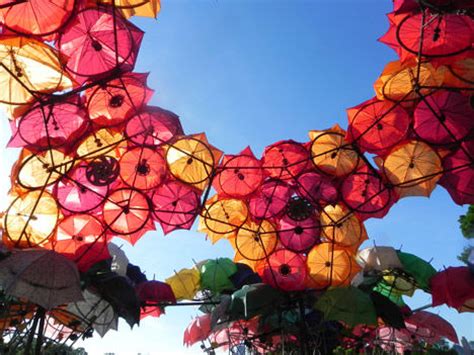 An umbrella or parasol is a folding canopy supported by wooden or metal ribs that is usually mounted on a wooden, metal, or plastic pole. Upcycled Umbrella Art : Umbrella Canopy