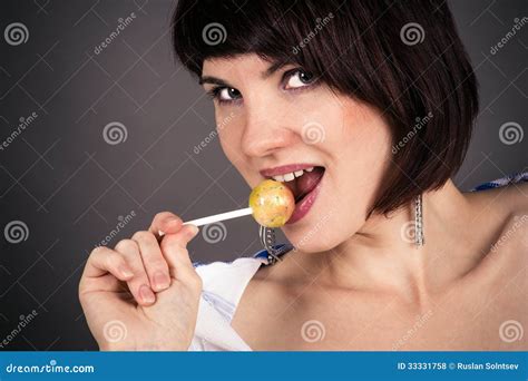 Beautiful Woman With A Lollipop In Hand Royalty Free Stock Photos Image