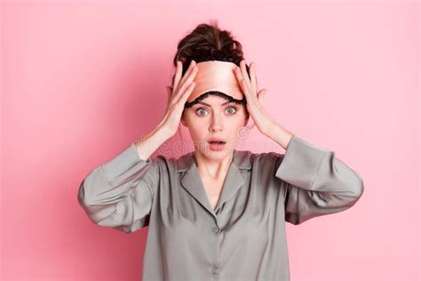 Portrait Of Attractive Worried Girl Wearing Pajama Mask Healthy Life Regime Isolated Over Pink