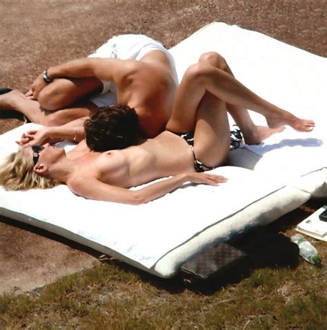 Sharon Stone Goes Topless Donning String Bikini In Stunning Poolside