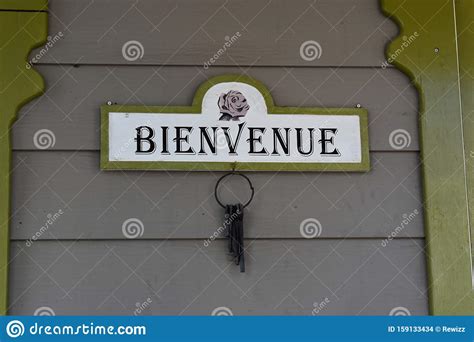 Picture of Welcome Sign Bienvenue in French on a Door with Old Keys ...