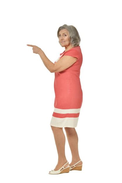 Premium Photo Portrait Of Senior Woman In Red Dress On White Background