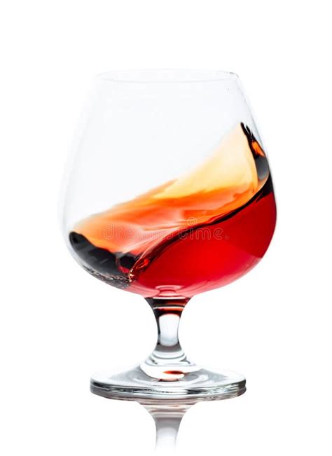 Splash Of Cognac In Glass On White Background Stock Image Image Of Black Glossy 30358349