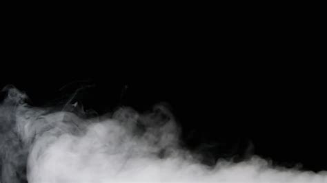 White Smoke On Black Background Stock Video Motion Array