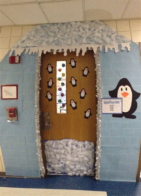 A Penguin Themed Classroom Door Decorated With Snow And Paper Machs For