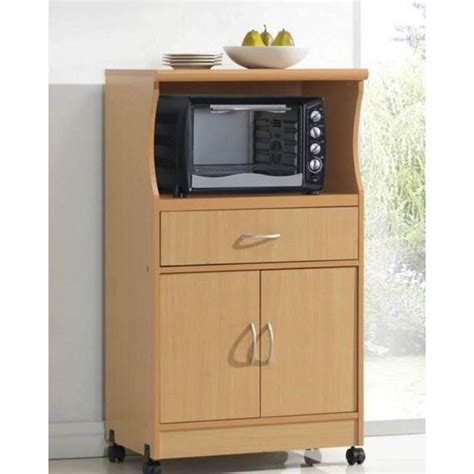Made of solid wood, the kitchen cart features a white paint finish and a natural wood top. Beech Wood Microwave Cart Kitchen Cabinet with Wheels and ...