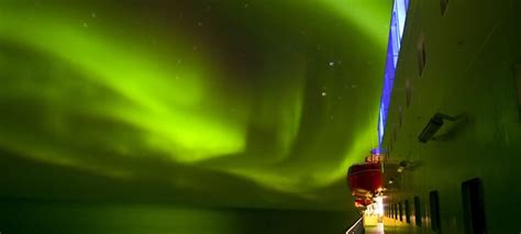 Northern Lights Over The Hurtigruten In Northern Norway Photo