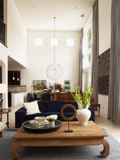 Contemporary Cream Living Room With High Ceilings And Blue Sofa Hgtv