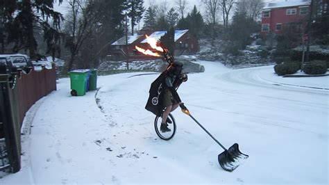 The Unipiper Dresses As Darth Vader And Shovels Snow While Playing His