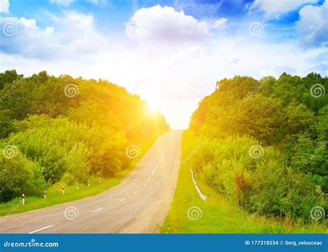 Dawn Over Road In Rural Area Stock Photo Image Of Hill Straight