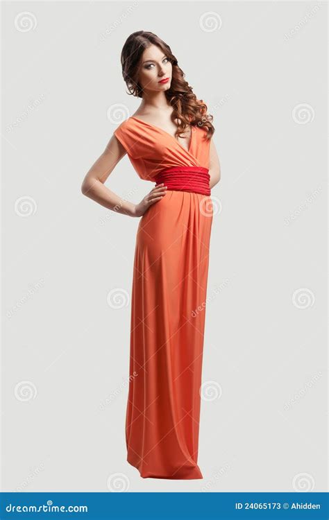 Model Posing In Orange Dress Stock Image Image Of Stiletto Slim
