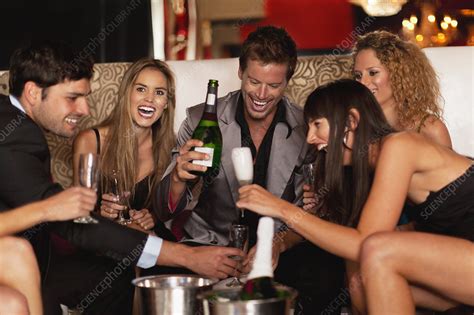 Friends Drinking Champagne In Club Stock Image F0051286 Science Photo Library