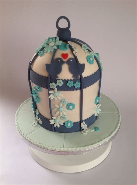 Birdcage Wedding Cake In Navy Blue And Ivory With Jade And Turquoise Flowers Love Birds And A