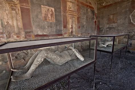 photo plaster casts of bodies in pompeii italy