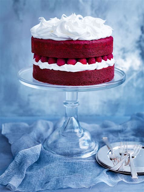 A red velvet cake is instantly recognizable with its bright red color offset by a white cream cheese frosting. Red Velvet Cake With Marshmallow Icing | Donna Hay