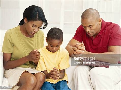 Boys Praying Photos And Premium High Res Pictures Getty Images