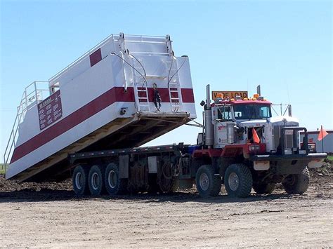 Kw Loading A Portion Of An Oil Field Operation Heavy Duty Trucks