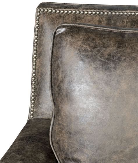 Looking to add an arm chair set to your living room or bedroom? Leather armchair with nailhead trim