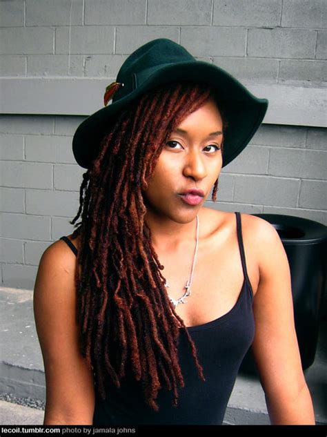 Long Red Dreadlocks With A Hat Black