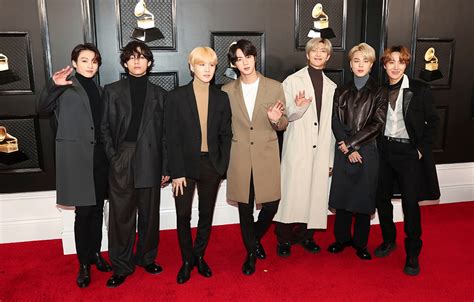 Bts member v who sported a black turtle neck, his signature wide pants, and a long black coat at the red carpet stole the limelight from everyone as fans as well as. BTS Wears Bottega Veneta on the Grammy Awards 2020 Red Carpet - Footwear News