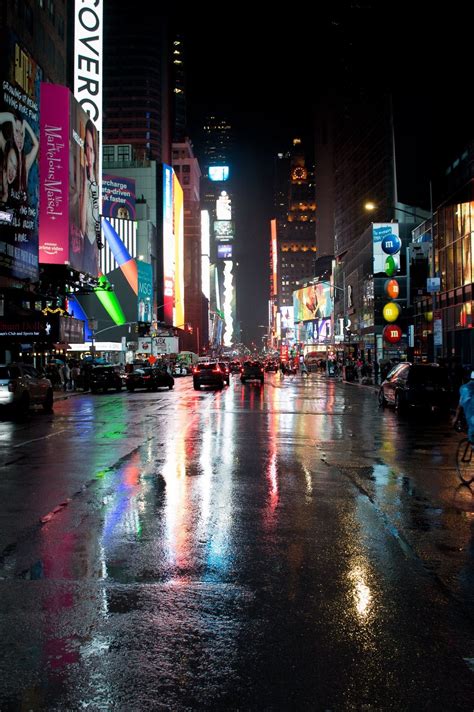 Street Reflections Rainy Night In Times Square New York City City