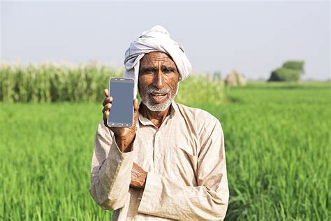 Indian Rural Farmer Old Man Showing Mobile Phone Standing Farm