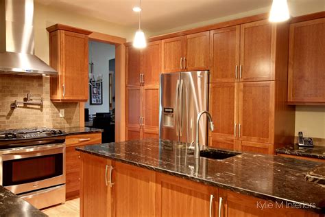 In terms of appearance, cherry is a very dark wood, so it's a good idea to. Natural cherry cabinets in kitchen, island, pantry wall ...