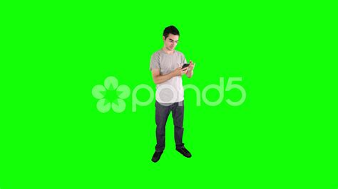 4k Full Body Green Screen Man Using Smartphone Stock Footage Ad