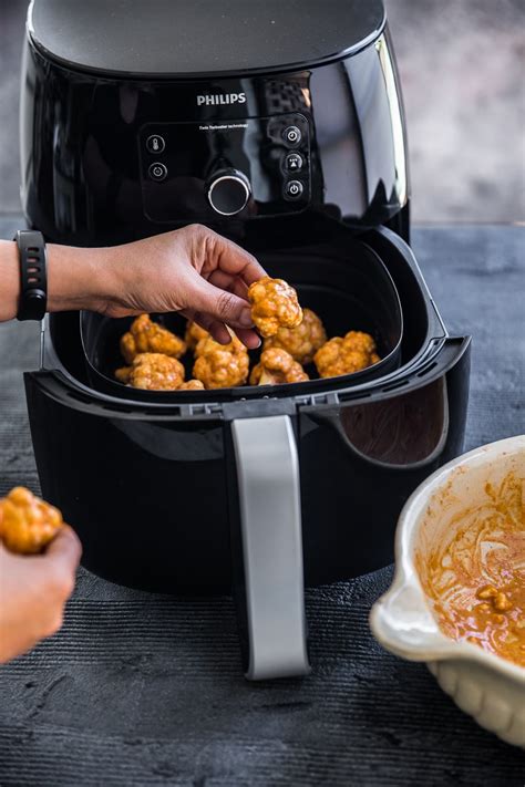 Air frying chicken wings has the same terrific results. cauliflower_buffalo_wings_airfryer6 - Cook Republic
