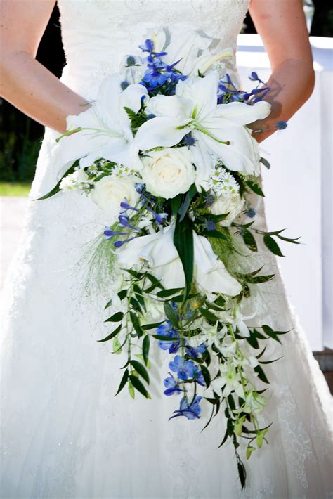 my wedding bouquet cascading bridal bouquet with lilies blue delphinium bells of ireland