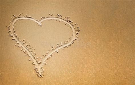 finger drawn heart on the sand symbol of love stock image image of nature light 146922683