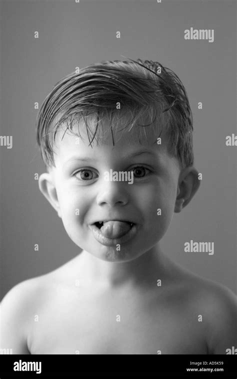 Child Making Funny Face Showing Tongue Funny Face Stock Photo Alamy