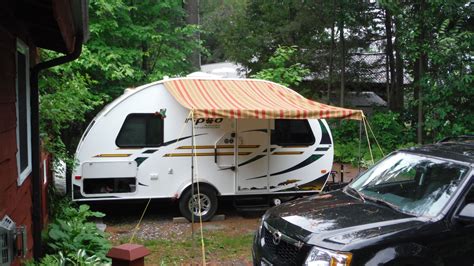 I have a bestop supertop on the truck that i would like to sleep in sometimes. Just made this awning. Sailrite DIY poles and track ...
