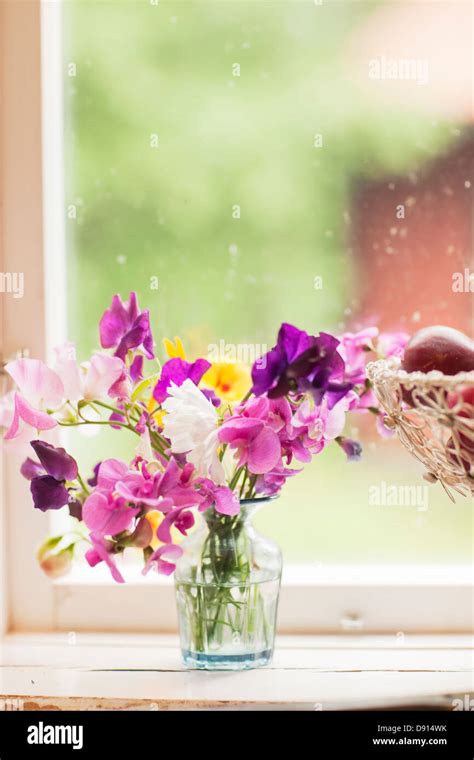Bouquet On Window Sill Stock Photo Alamy