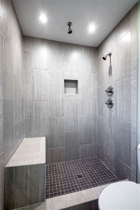 Yes, you can diy this job. Leonia silver tile from Lowes. Tiled shower, bathroom ...