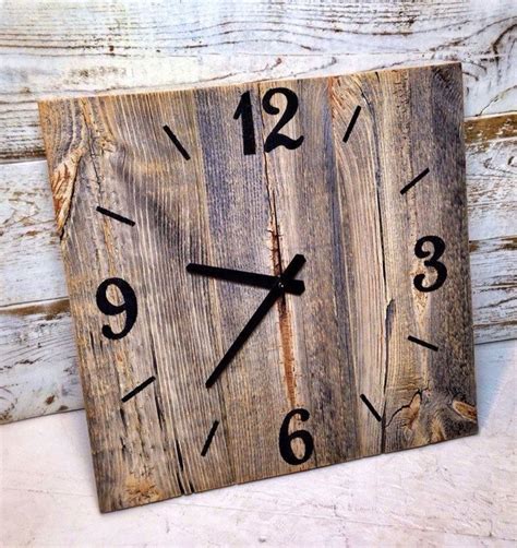 A Clock Made Out Of Wood With Numbers On The Face And Hands Sitting