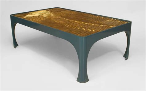 Excellent condition 1200mm table with solid cast steel legs and adjustable feet. 1970s American Inset Gilt Resin and Lacquered Wood Coffee ...