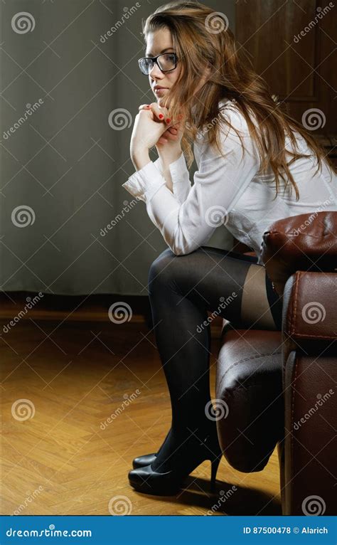 The Girl In Glass And Stockings Sits Stock Photo Image Of Glass