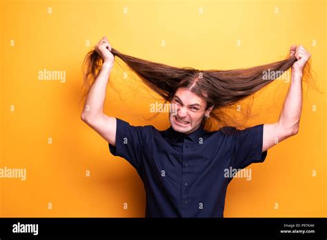 Very Angry Man Pulling His Hair Stock Photo Alamy