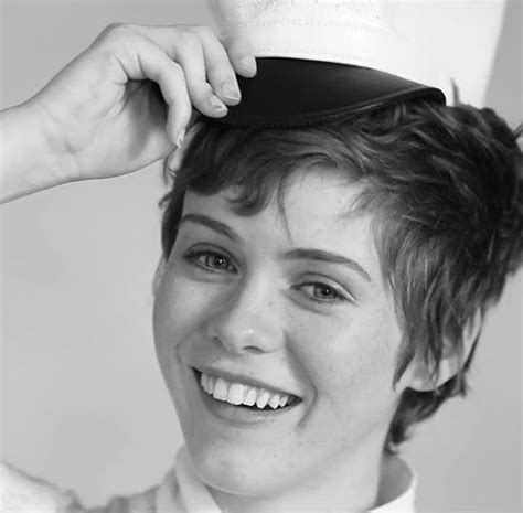 Black And White Photograph Of A Smiling Woman Wearing A Sailor S Hat On Top Of Her Head