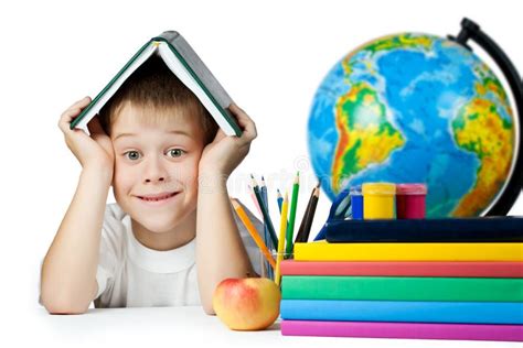 Funny Schoolboy With A Book On Her Head Isolated Stock Image Image