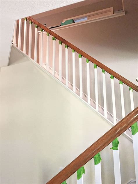 Painting your handrail a different color from your balusters is a popular look. How to Paint Your Stair Railing and Banister Black from ...