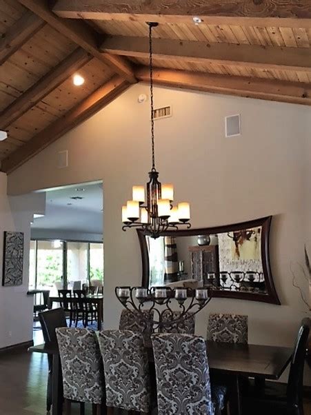But a higher ceiling may mean higher construction and energy costs. Hanging rectangular chandelier with 2 wires on sloped ceiling