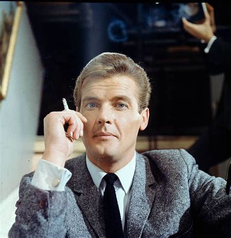 English Actor Roger Moore Pictured Smoking A Cigarette On The Set Of Actors Roger Moore