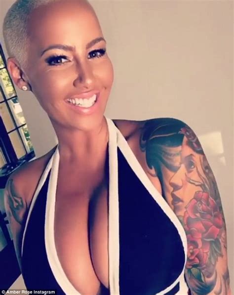 Amber Rose Is All Curves In A Skintight Black Jumpsuit After Instagram