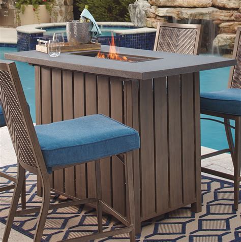Partanna Blue And Beige Outdoor Bar Table From Ashley Coleman Furniture