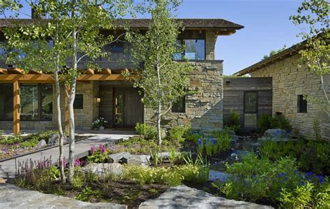 Contemporary Stone Farmhouse With Aged Wood Siding Modern House Designs