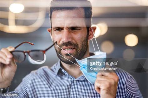 Taking Off Glasses Photos And Premium High Res Pictures Getty Images