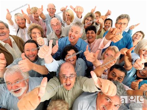 A Group Of People Giving The Thumbs Up Sign Stock Photo Picture And